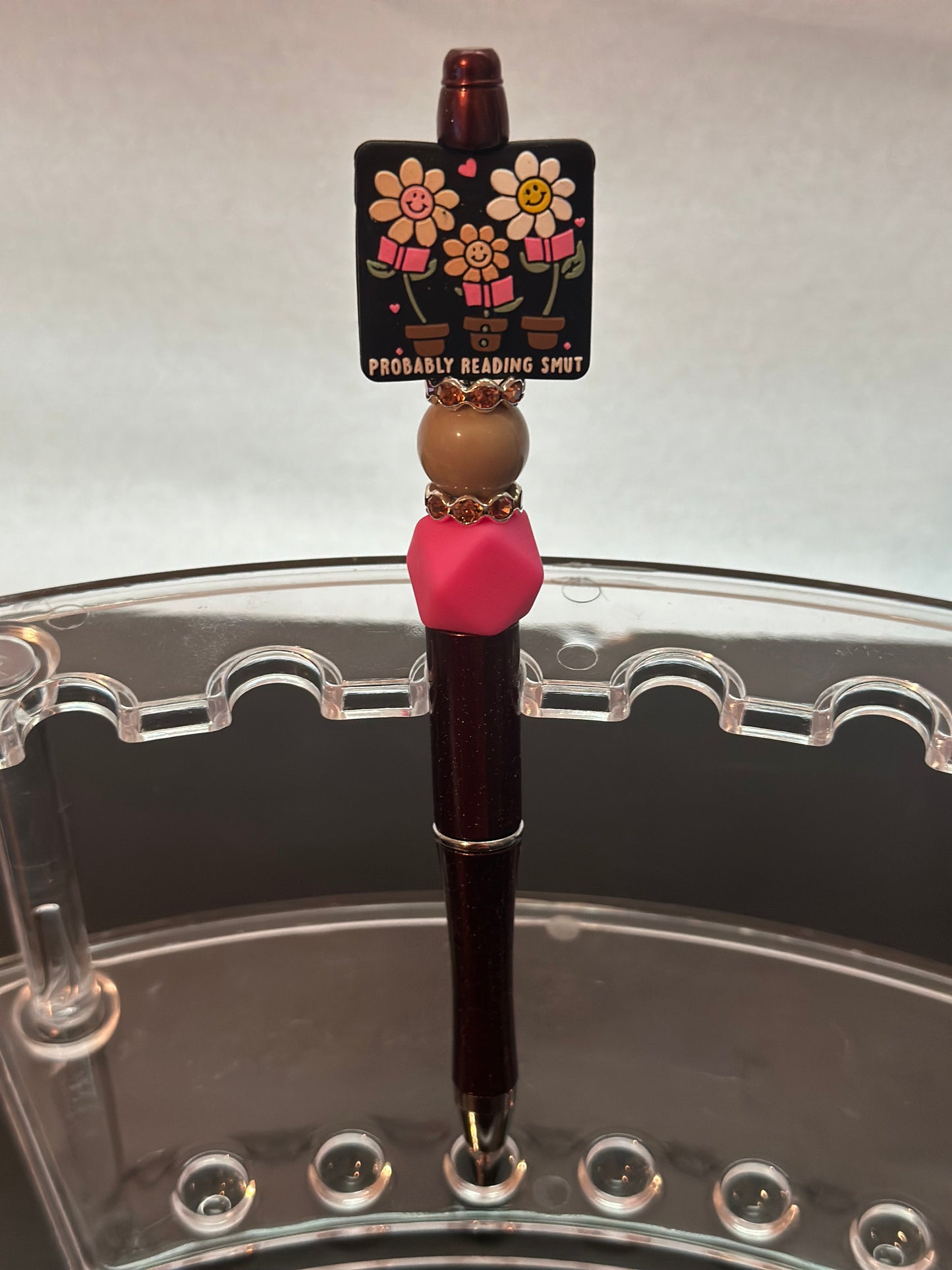 Flower Probably reading smut Pen